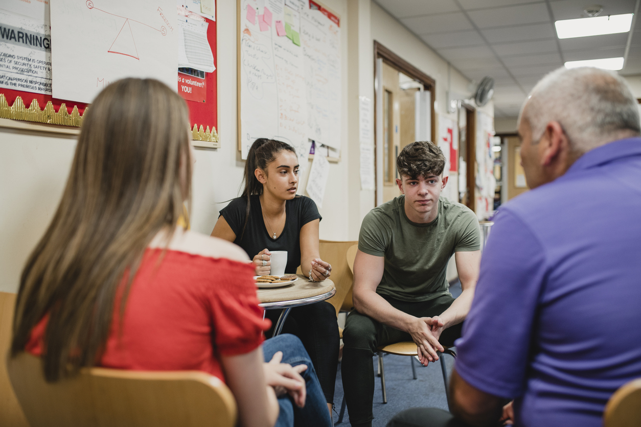 Young person walking with a support worker