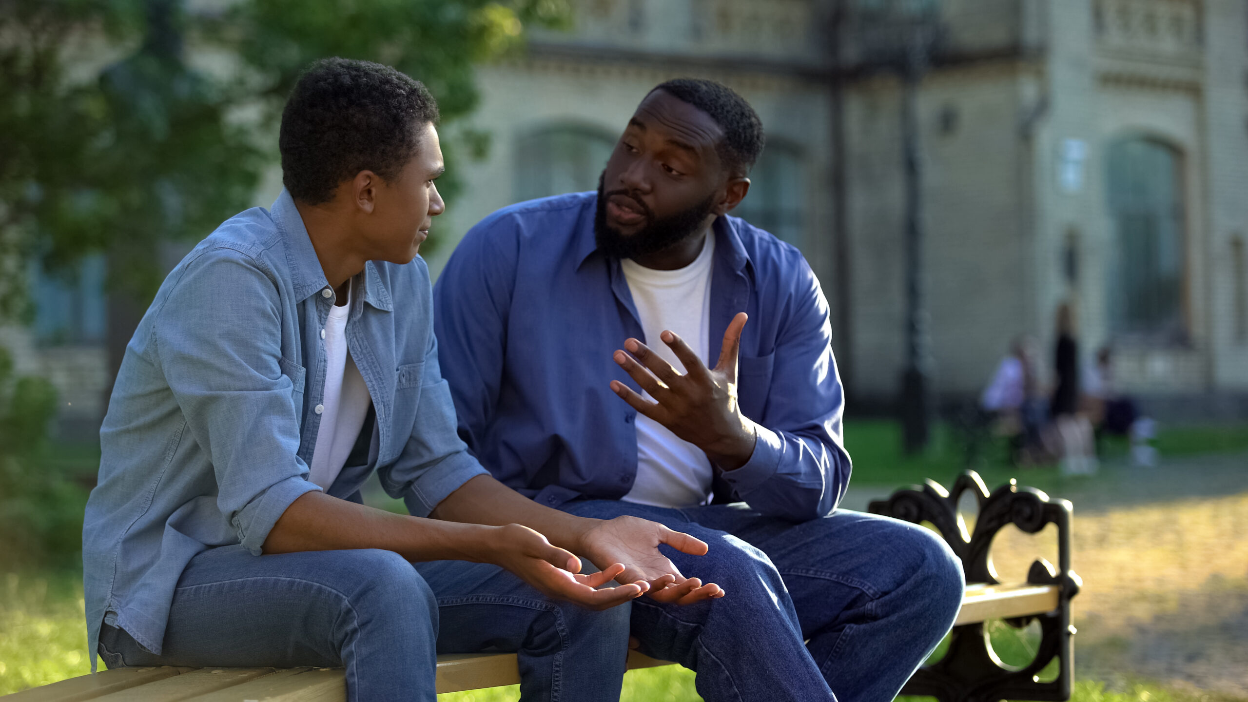 Support worker talking with a young person
