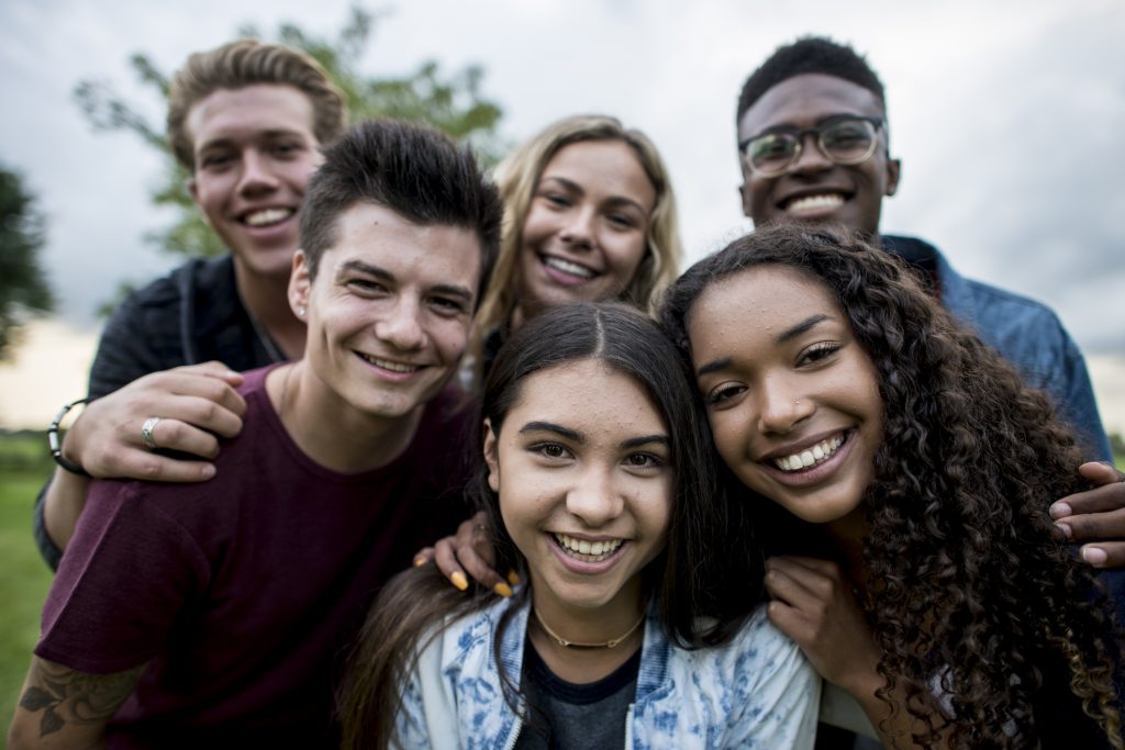 Young people from different backgrounds together